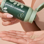 A bit Hippy Powder Exfoliant sprinkled into a hand