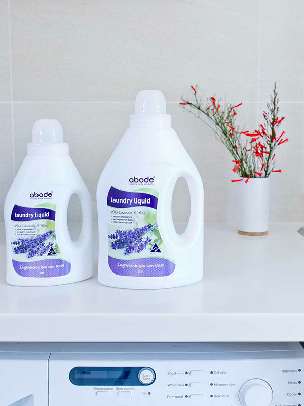 Abode Laundry Liquid Lavender and Mint on a washing machine