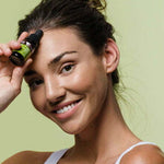 Botani Acai Berry Active Antioxidant Serum 15ml — model holding serum
