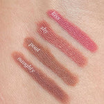 Four lipstick swatches labeled kiss, shy, pout, and naughty are shown on light skin in pink and brown shades—perfectly paired with Ere Perez Acai Lip Pencils 1.1g for a smooth, flawless finish.
