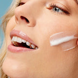 Close-up of ACURE Ultra Hydrating Green Juice Cleanser applied to the face