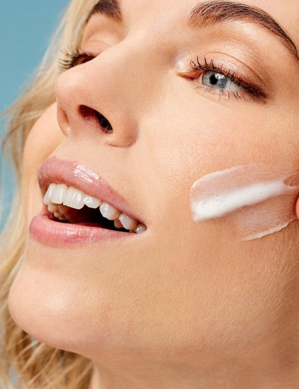 Close-up of ACURE Ultra Hydrating Green Juice Cleanser applied to the face