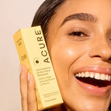 Model holding ACURE Ultra Hydrating 12 Hour Facial Moisturizer beside her face
