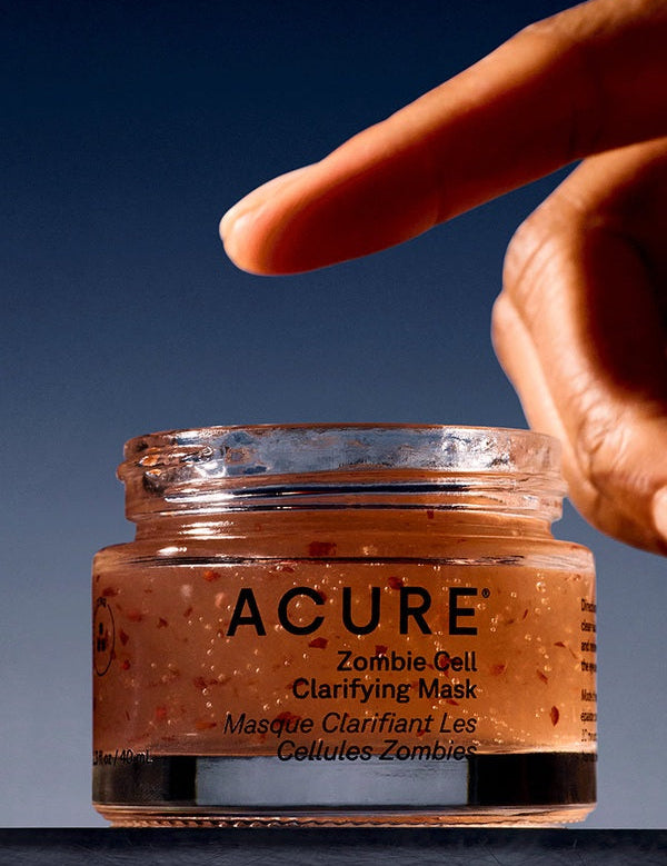 Hand using Acure Zombie Cell Clarifying Mask