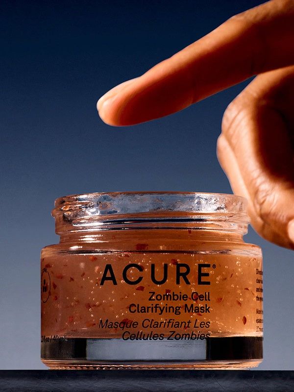 Hand using Acure Zombie Cell Clarifying Mask