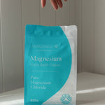 Amazing You Daily Magnesium Flakes in a clean bathroom lifestyle setting