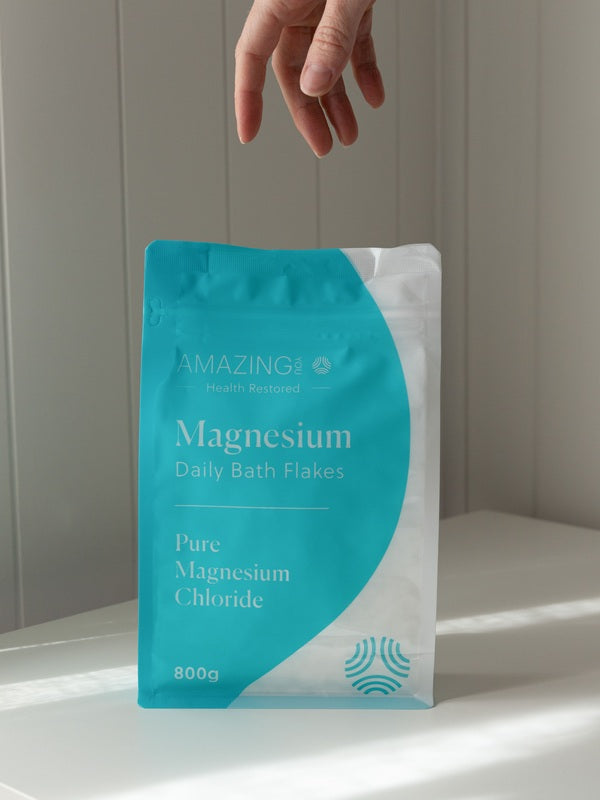 Amazing You Daily Magnesium Flakes in a clean bathroom lifestyle setting