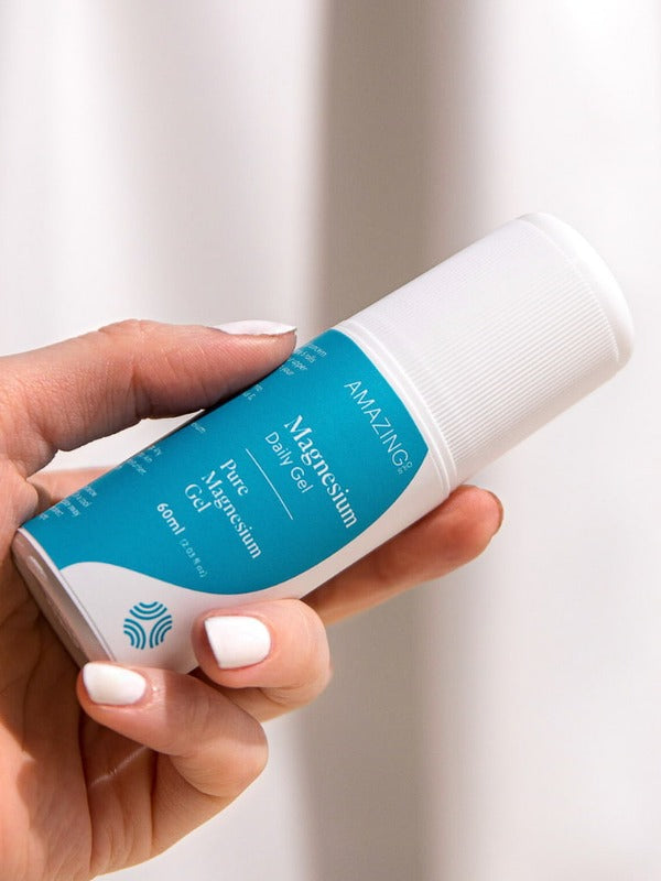 Amazing You Daily Magnesium Gel held in hand