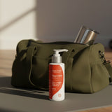 Amazing You Joint Magnesium Lotion beside a gym bag
