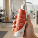 Amazing You Joint Magnesium Lotion held in a gym