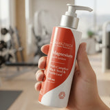 Amazing You Joint Magnesium Lotion held in a gym
