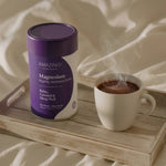 Amazing You Nightly Wellness Drink beside a bed