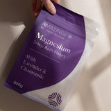 Amazing You Sleep Magnesium Flakes held in hand