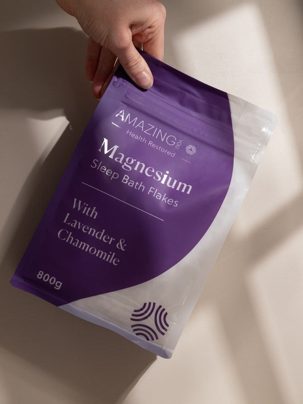Amazing You Sleep Magnesium Flakes held in hand