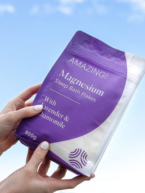 Amazing You Sleep Magnesium Flakes held in hand