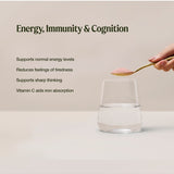 A hand holds pink powder above water. The Organic Iron graphic lists normal energy, less tiredness, sharp thinking and vitamin C aiding iron absorption.