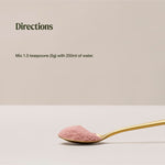 Organic Iron directions graphic above a gold spoon of pink powder: mix 1.5 teaspoons (5 g) with 250 ml of water.
