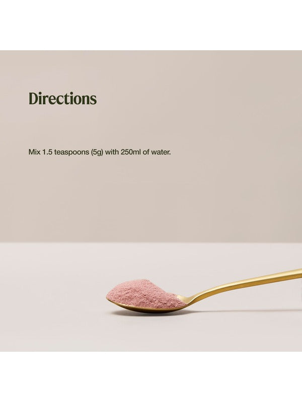 Organic Iron directions graphic above a gold spoon of pink powder: mix 1.5 teaspoons (5 g) with 250 ml of water.