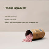A tipped canister spills pink powder. Text lists 100% daily iron intake from curry leaves, with vitamin C from acerola, baobab, camu camu and Kakadu plum.