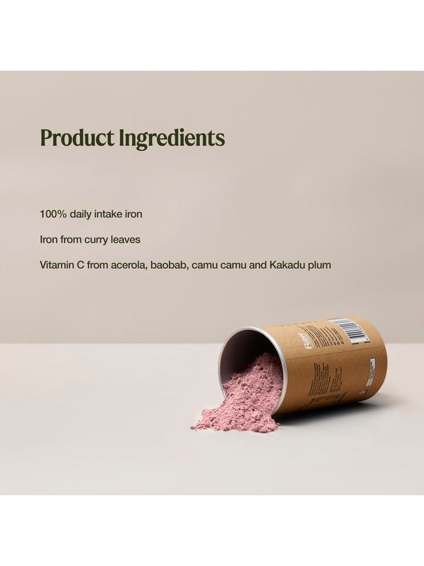 A tipped canister spills pink powder. Text lists 100% daily iron intake from curry leaves, with vitamin C from acerola, baobab, camu camu and Kakadu plum.