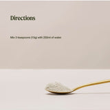 Organic Multivitamin directions graphic above a gold spoon of pale powder: mix 3 teaspoons (10 g) with 250 ml of water.