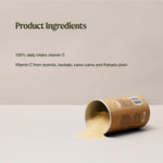 Pale yellow Amazonia Vitamin C powder spills from a brown cardboard canister. The ingredient graphic states 100% daily intake of vitamin C from acerola, baobab, camu camu and Kakadu plum.