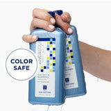 Andalou Argan Stem Cell Conditioner held in hand