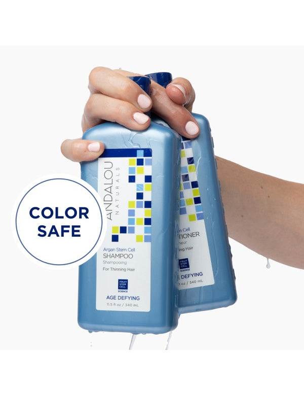 Andalou Argan Stem Cell Conditioner held in hand