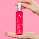 Andalou 1000 Roses Biome Balancing Toner held in hand