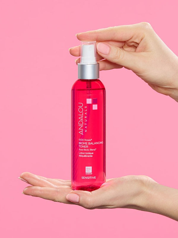 Andalou 1000 Roses Biome Balancing Toner held in hand