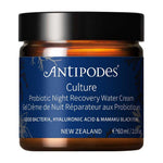 Antipodes Culture Probiotic Night Recovery Water Cream in an amber glass jar with a navy blue botanical label, white lettering and a wide black lid.