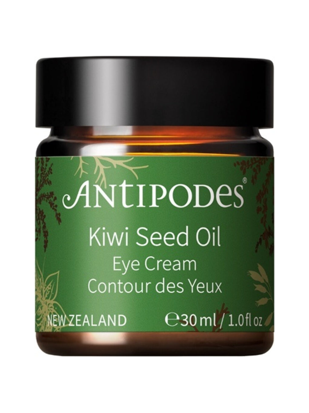 Antipodes Kiwi Seed Oil Eye Cream in an amber glass jar with a green label, gold botanical details and a wide black lid, on white.