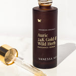 Dropper of Vanessa Megan Auric 24k Gold and Wild Herb Radiance Serum