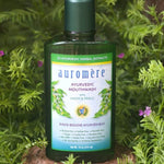 Auromere Ayurvedic Mouthwash in a botanical setting