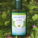 Auromere Ayurvedic Mouthwash in a botanical setting