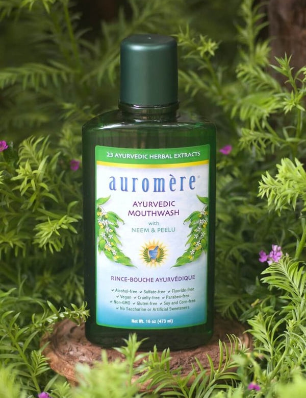 Auromere Ayurvedic Mouthwash in a botanical setting