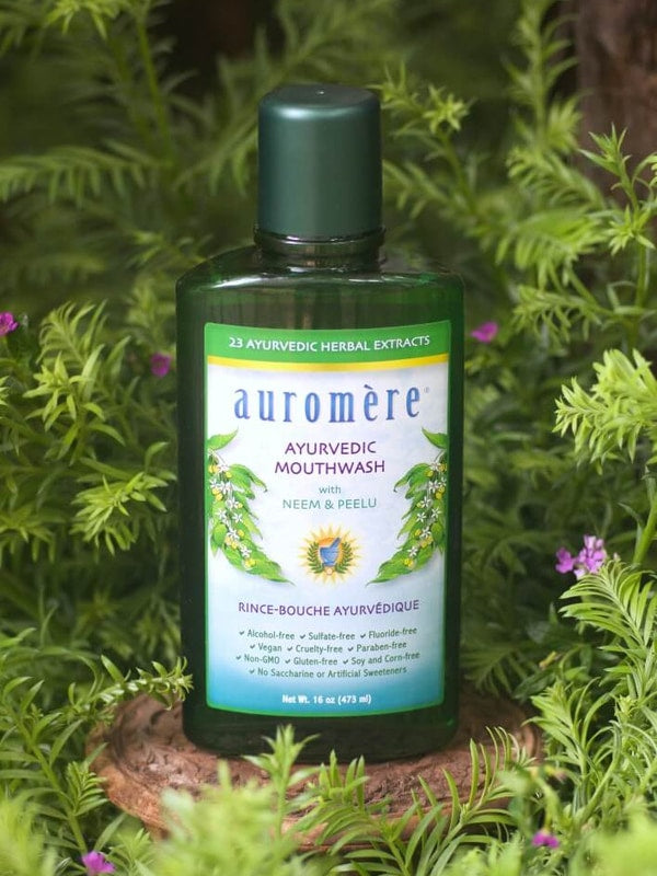 Auromere Ayurvedic Mouthwash in a botanical setting