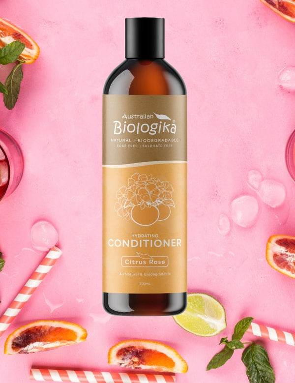 Australian Biologika Citrus Rose Conditioner — citrus rose conditioner styled with fruit