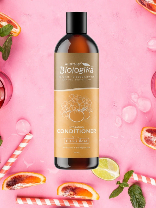 Australian Biologika Citrus Rose Conditioner — citrus rose conditioner styled with fruit
