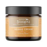 Australian Biologika Citrus Rose & Geranium Veggie Cream in a squat amber-brown jar with a wide black lid and a tan and peach-orange label.