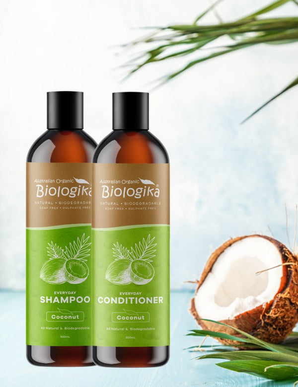 Australian Biologika Everyday Coconut Shampoo — coconut shampoo and conditioner in a tropical setting