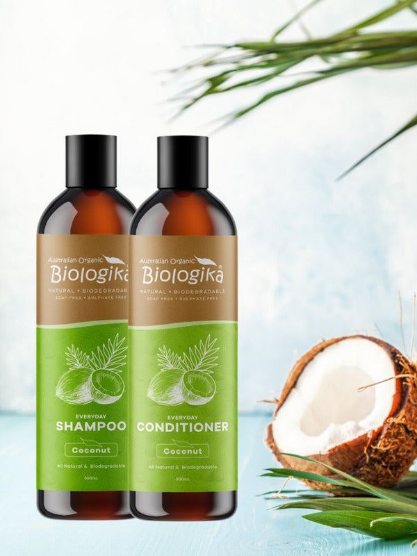 Australian Biologika Everyday Coconut Shampoo — coconut shampoo and conditioner in a tropical setting