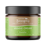 Australian Biologika Coconut Veggie Cream in a squat amber-brown jar with a wide black lid and a tan and green label with white lettering.
