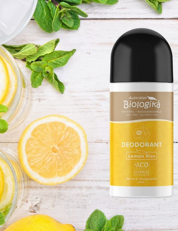 Australian Biologika Certified Organic Roll On Deodorant - Lemon Kiss 70ml — lemon deodorant styled with fresh lemons
