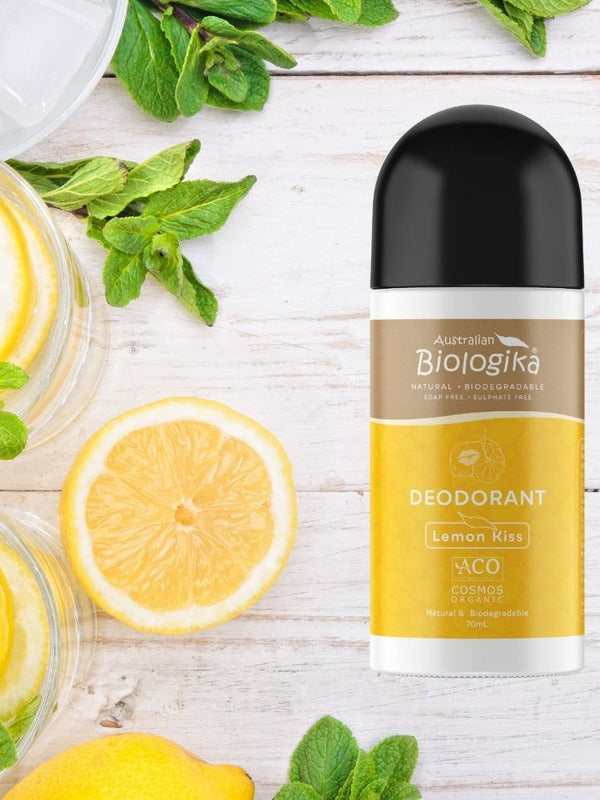 Australian Biologika Certified Organic Roll On Deodorant - Lemon Kiss 70ml — lemon deodorant styled with fresh lemons