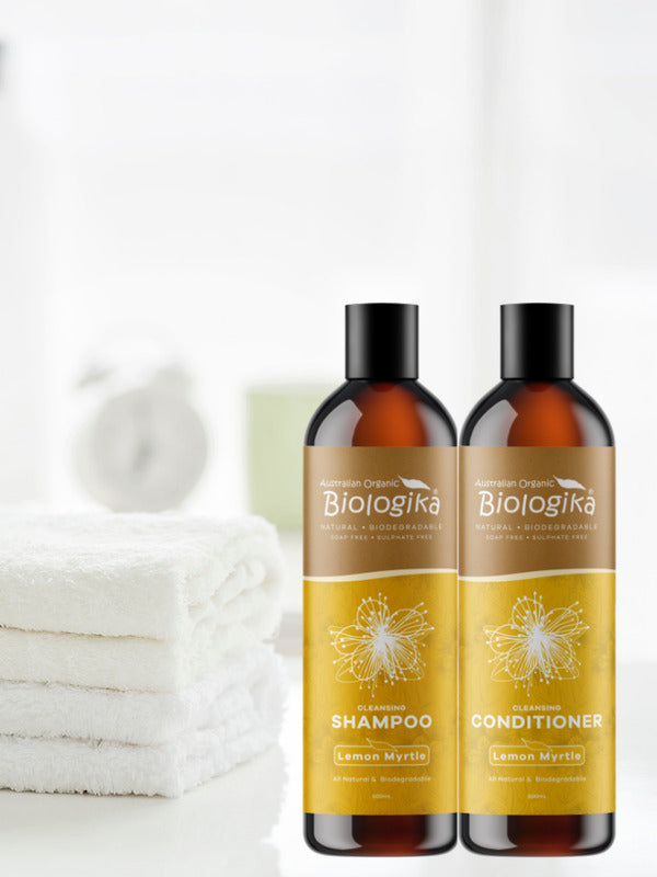 Australian Biologika Lemon Myrtle Conditioner — lemon myrtle shampoo and conditioner in a bathroom setting