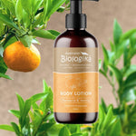 Australian Biologika Mandarin and Vanilla Body Lotion 250ml — mandarin and vanilla body lotion styled in citrus foliage