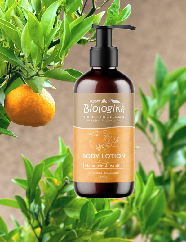 Australian Biologika Mandarin and Vanilla Body Lotion 250ml — mandarin and vanilla body lotion styled in citrus foliage