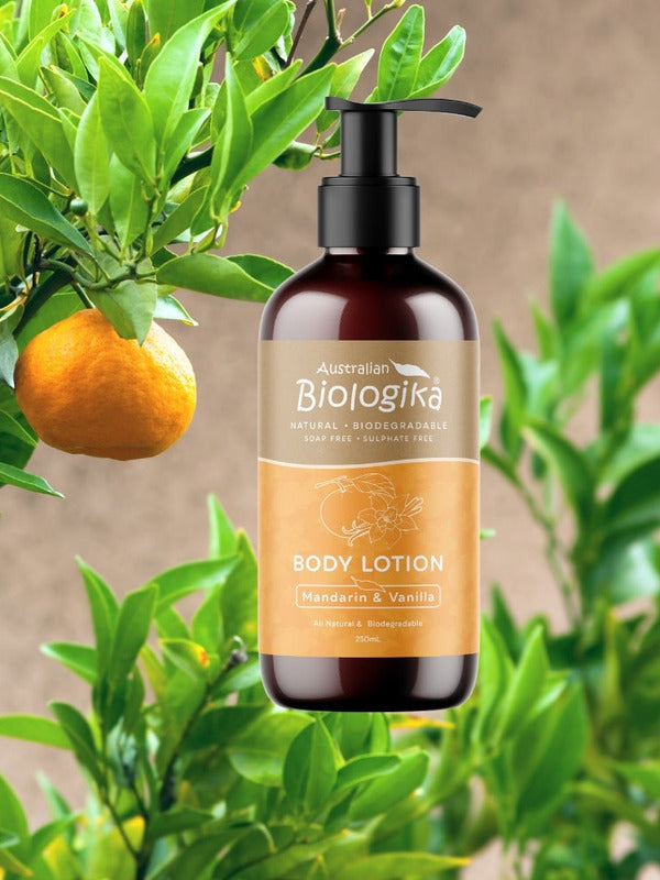 Australian Biologika Mandarin and Vanilla Body Lotion 250ml — mandarin and vanilla body lotion styled in citrus foliage