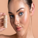 Model wearing Avocado Zinc SPF 50 Natural Bronzer in Light-Medium